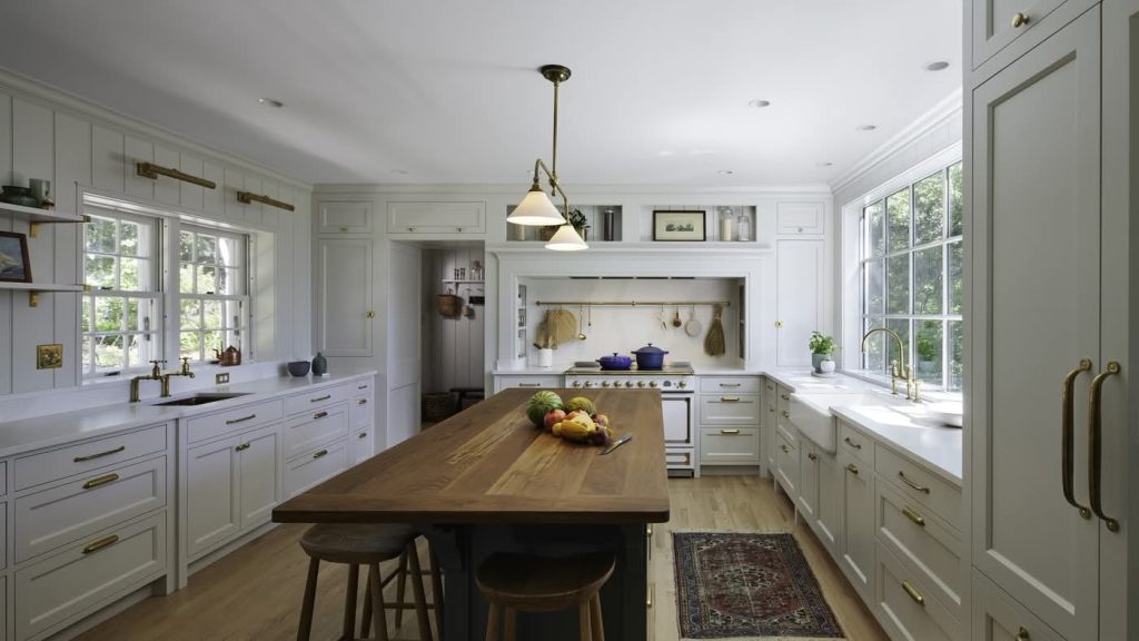 Bright modern farmhouse kitchen with wooden island