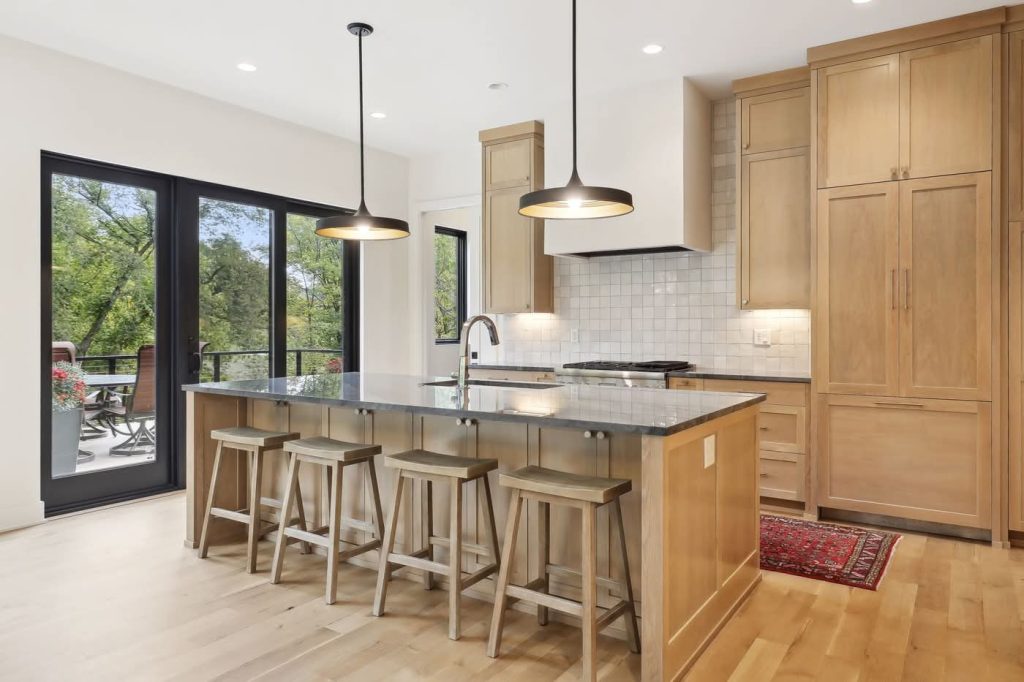 Modern kitchen with island and wooden cabinets