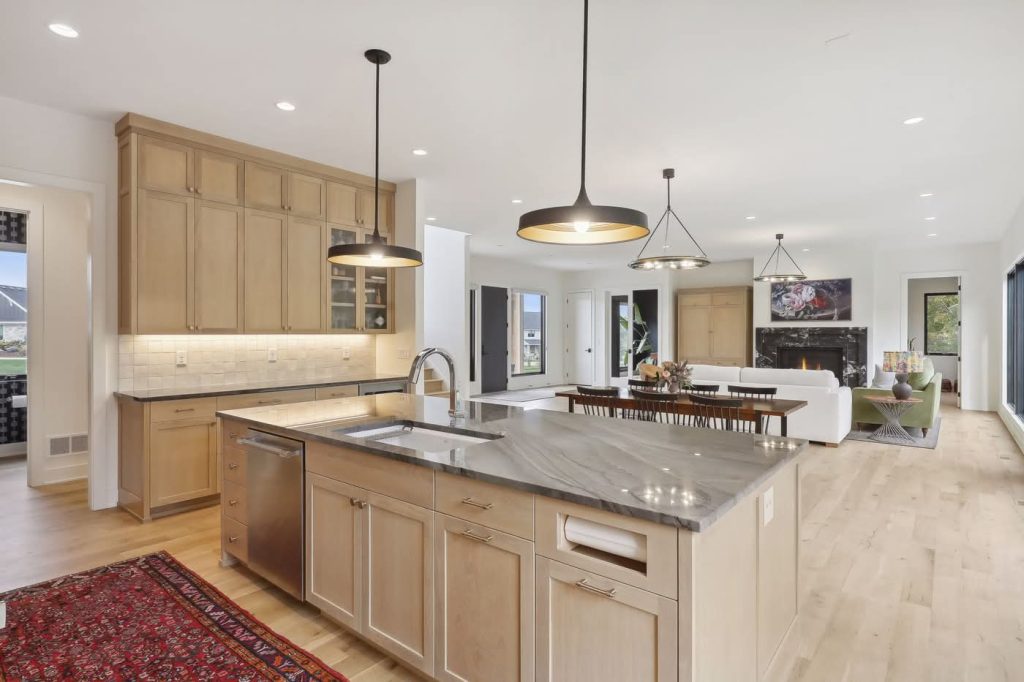 Modern open-concept kitchen with marble island