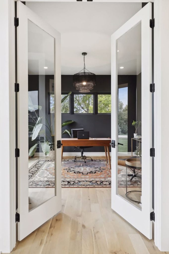 Modern home office with glass French doors