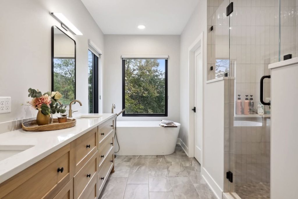 Modern bathroom with freestanding tub and glass shower