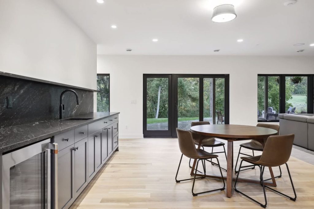 Modern kitchen and dining area with patio doors