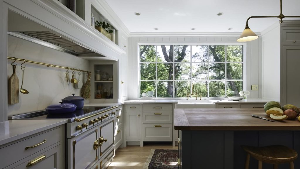Bright modern kitchen with large window and island