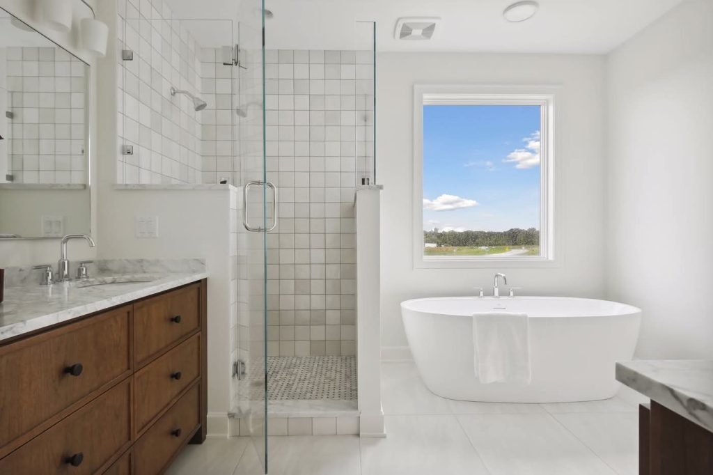 Modern bathroom with freestanding tub and glass shower