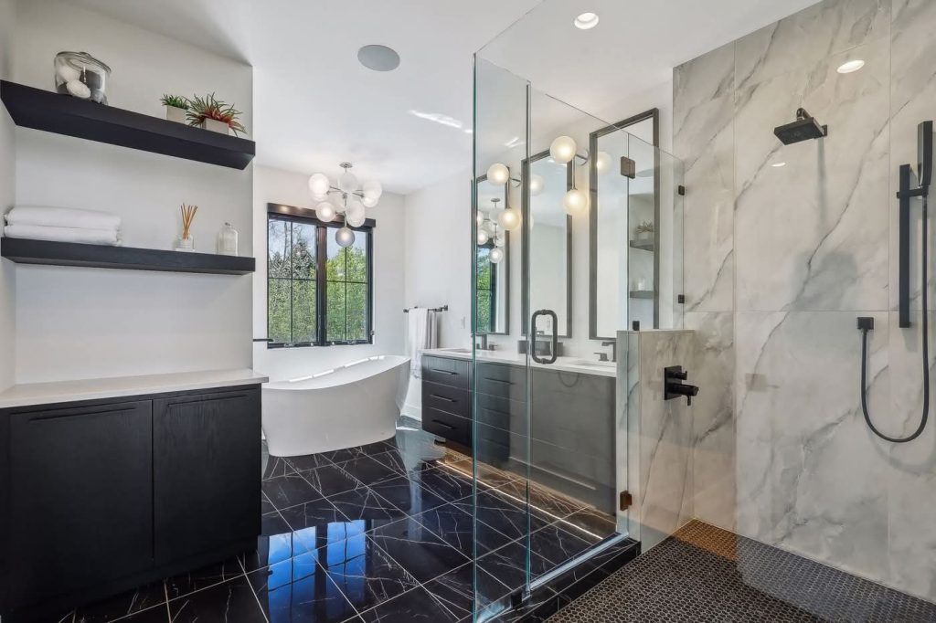 Modern luxury bathroom with freestanding tub and glass shower